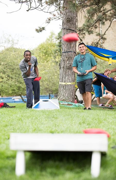 GVSU students playing a game on the Allendale campus.